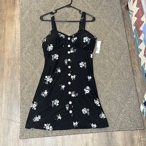 Black midi dress with floral accents